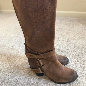 Tall leather boots with ankle straps